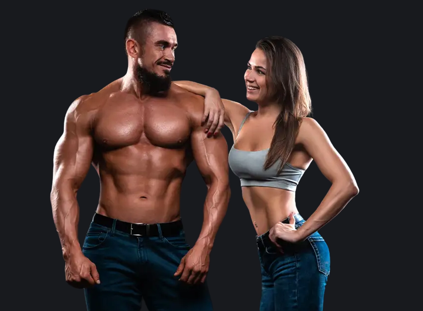a body building man and woman standing next to each other